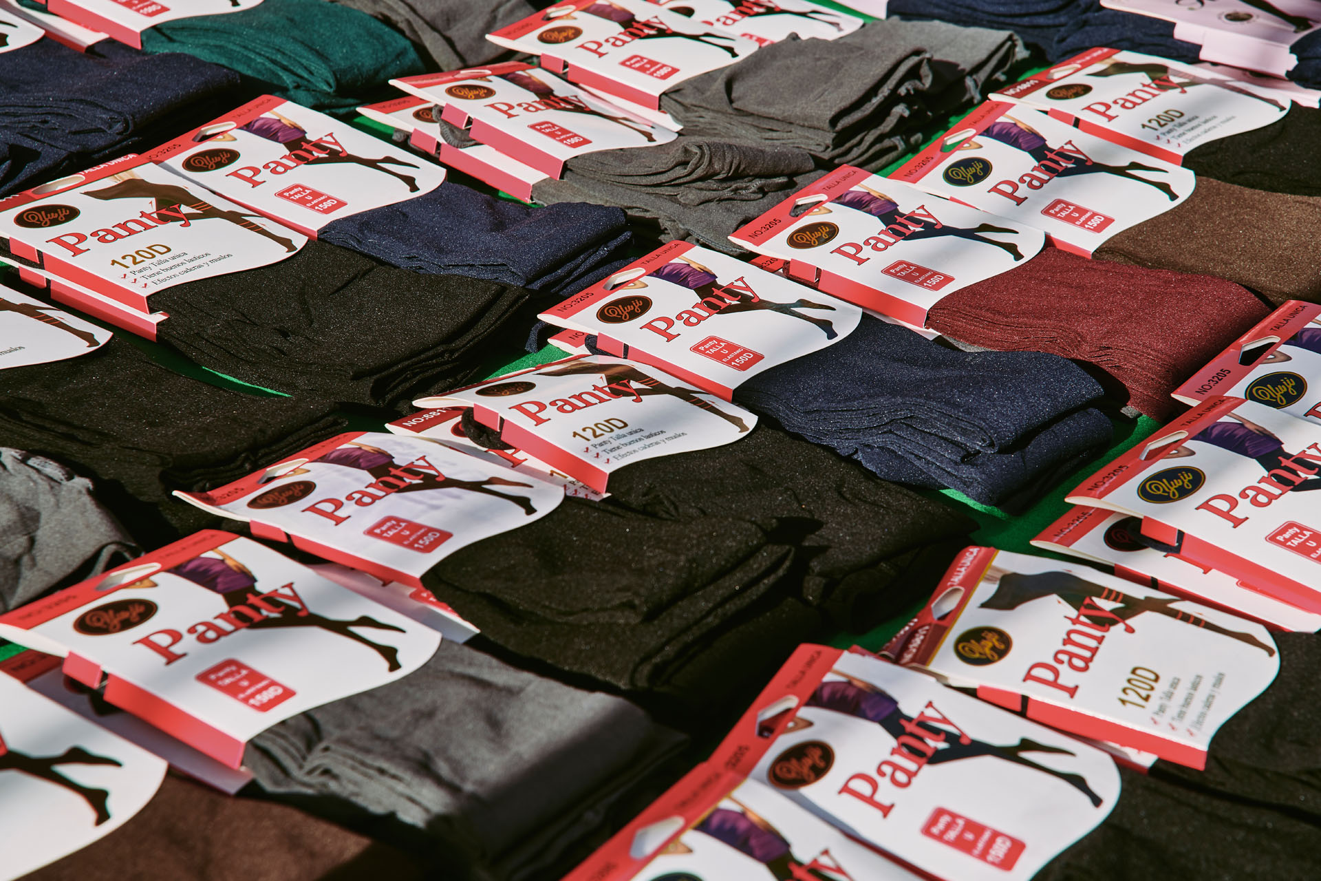 Foto de portada Puesto Mercado de Orcasur: textil David Muñoz