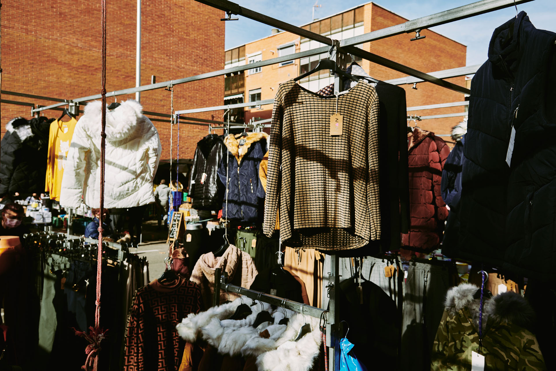 Photo de couverture Étal de marché d'Orcasur : vêtements de Gonzalez Heredia